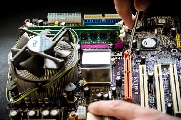 Close up view of engineer inspecting a computer